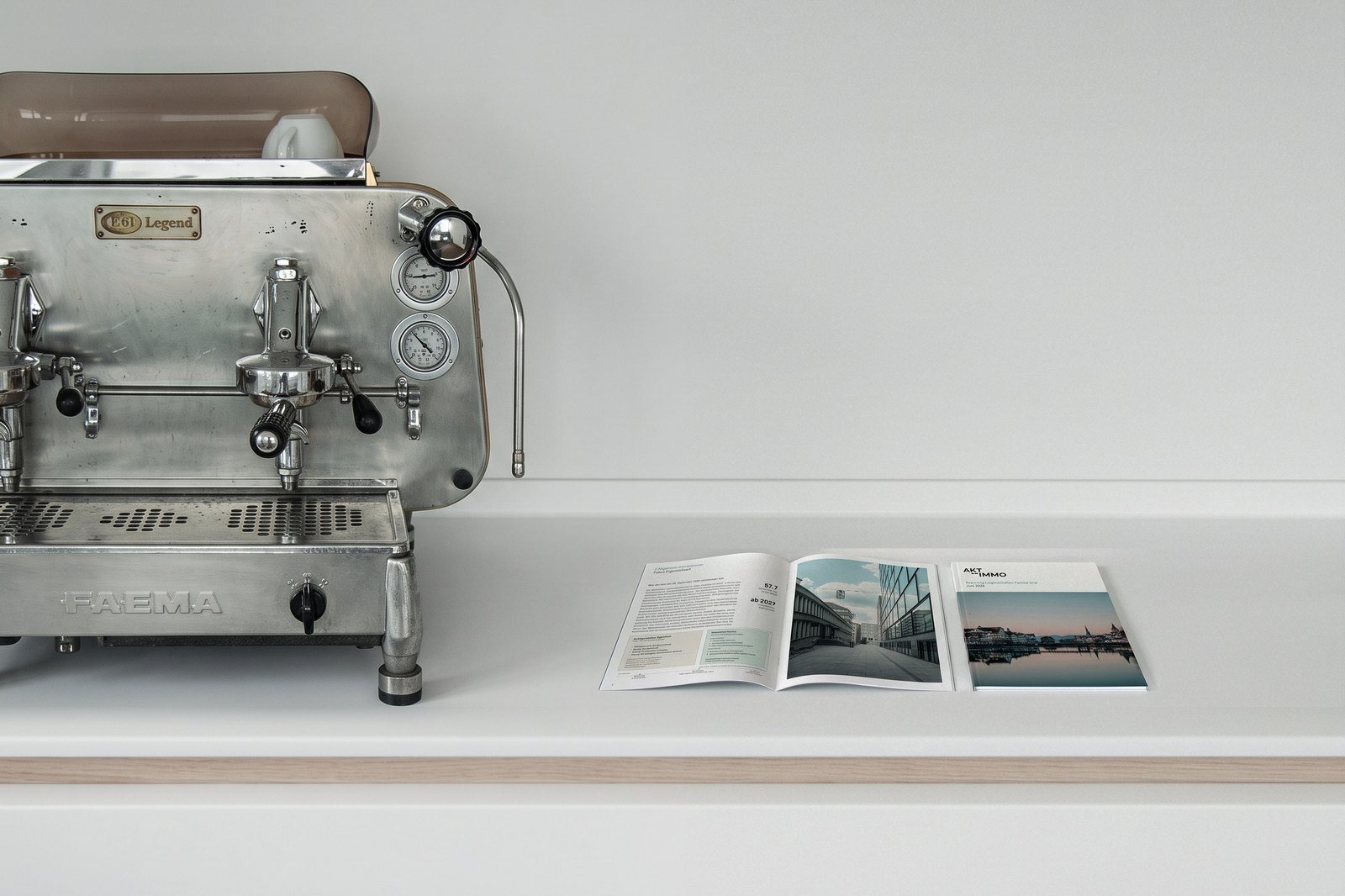 Printed property report next to an espresso machine